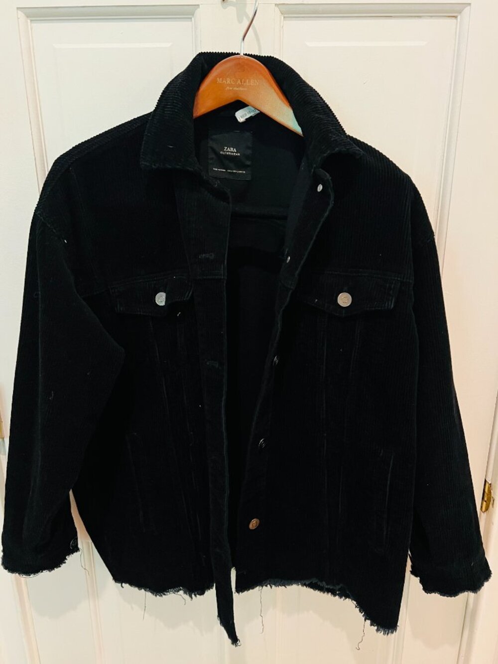 black corduroy jacket is from Zara and features a frayed hem Size Small